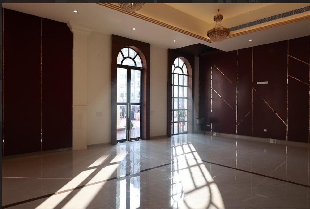7 Vachan lobby with marble floors and chandeliers — Judges Colony Patna